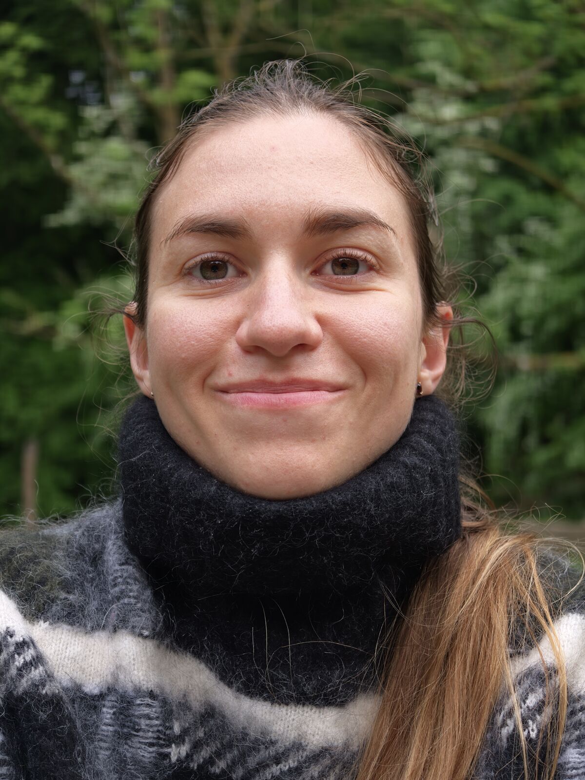 Olga, English teacher, smiling warmly
